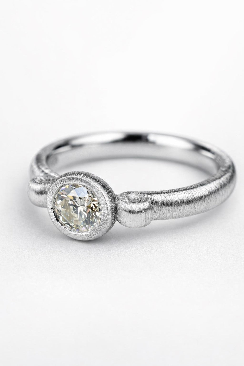 Diamond ring featuring a 0.50ct natural diamond reclaimed from vintage jewellery.