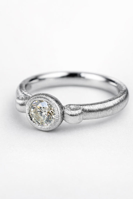 Diamond ring featuring a 0.50ct natural diamond reclaimed from vintage jewellery.