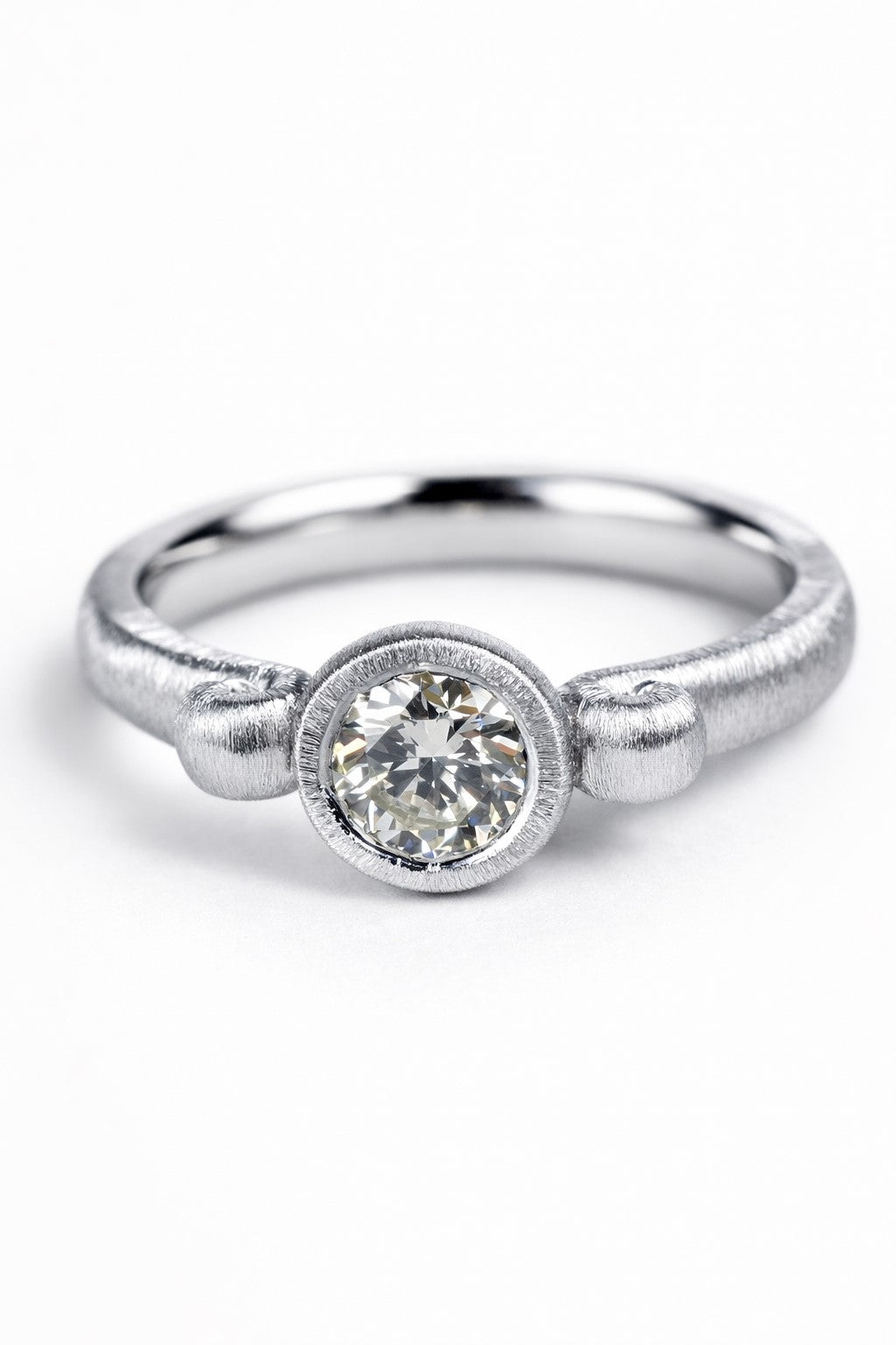 Diamond ring featuring a 0.50ct natural diamond reclaimed from vintage jewellery.