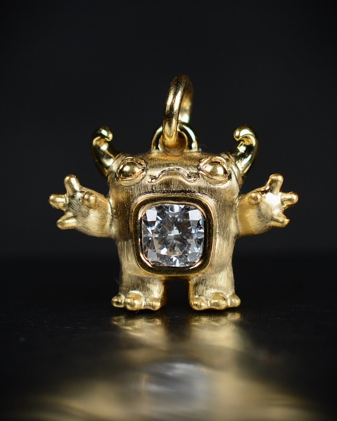 Gold Cushion Creature and gold chain, Bright Creature set with a natural cushion-cut diamond.