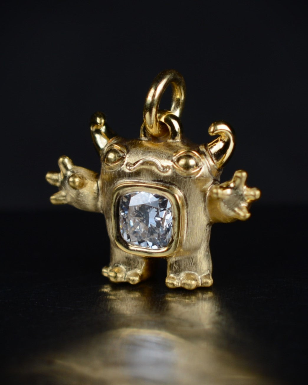 Gold Cushion Creature and gold chain, Bright Creature set with a natural cushion-cut diamond.