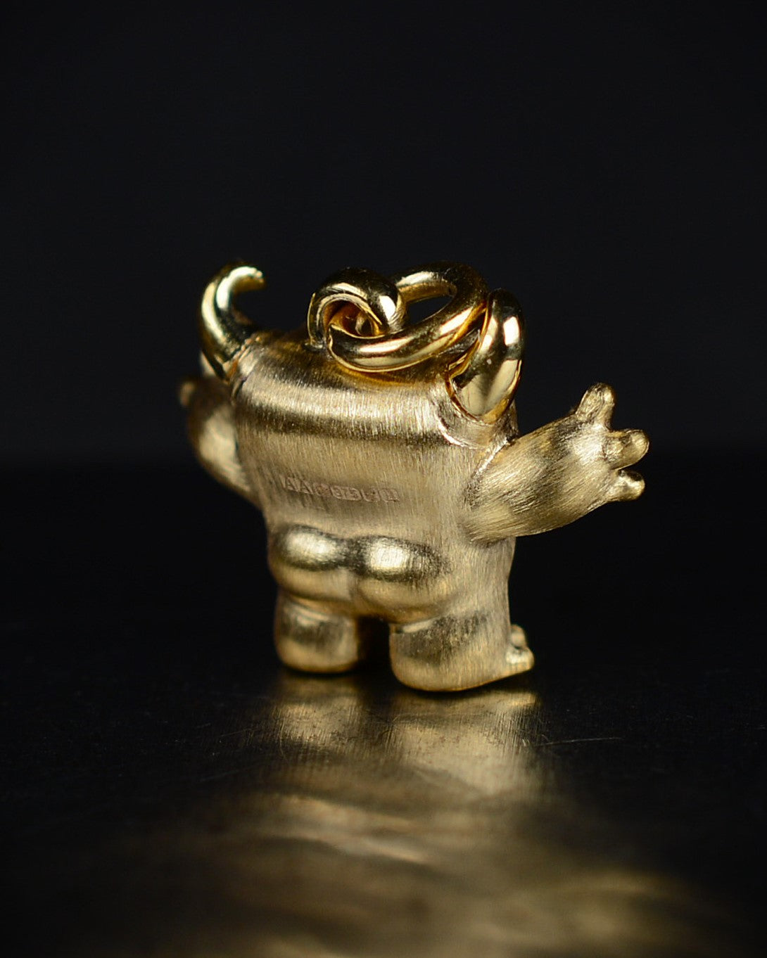 Gold Cushion Creature and gold chain, Bright Creature set with a natural cushion-cut diamond.