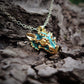 Gold dragon's head with diamond eyes and a gold chain. *This piece is finished and ready to be shipped* © Adrian Ashley