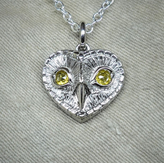 Diamond owl necklace. Platinum coated sterling silver heart shaped owl head pendant with natural, rose cut, diamond eyes *This piece is finished and ready to be shipped*© Adrian Ashley