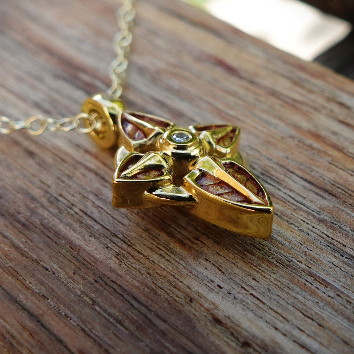 Little gold and diamond cross with a solid gold chain.  *This piece is finished and ready to be shipped*© Adrian Ashley