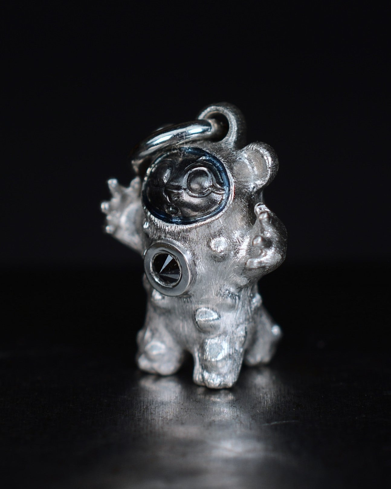 De Bears Cub Bright Creature with a black diamond and a black rhodium face.