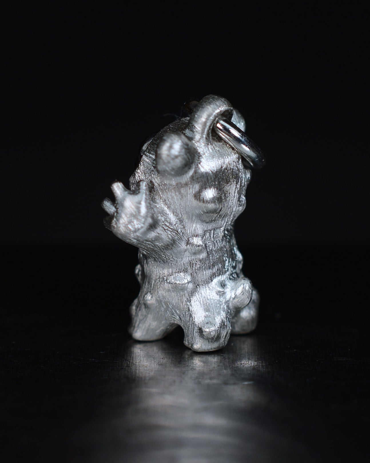 De Bears Cub Bright Creature with a black diamond and a black rhodium face.