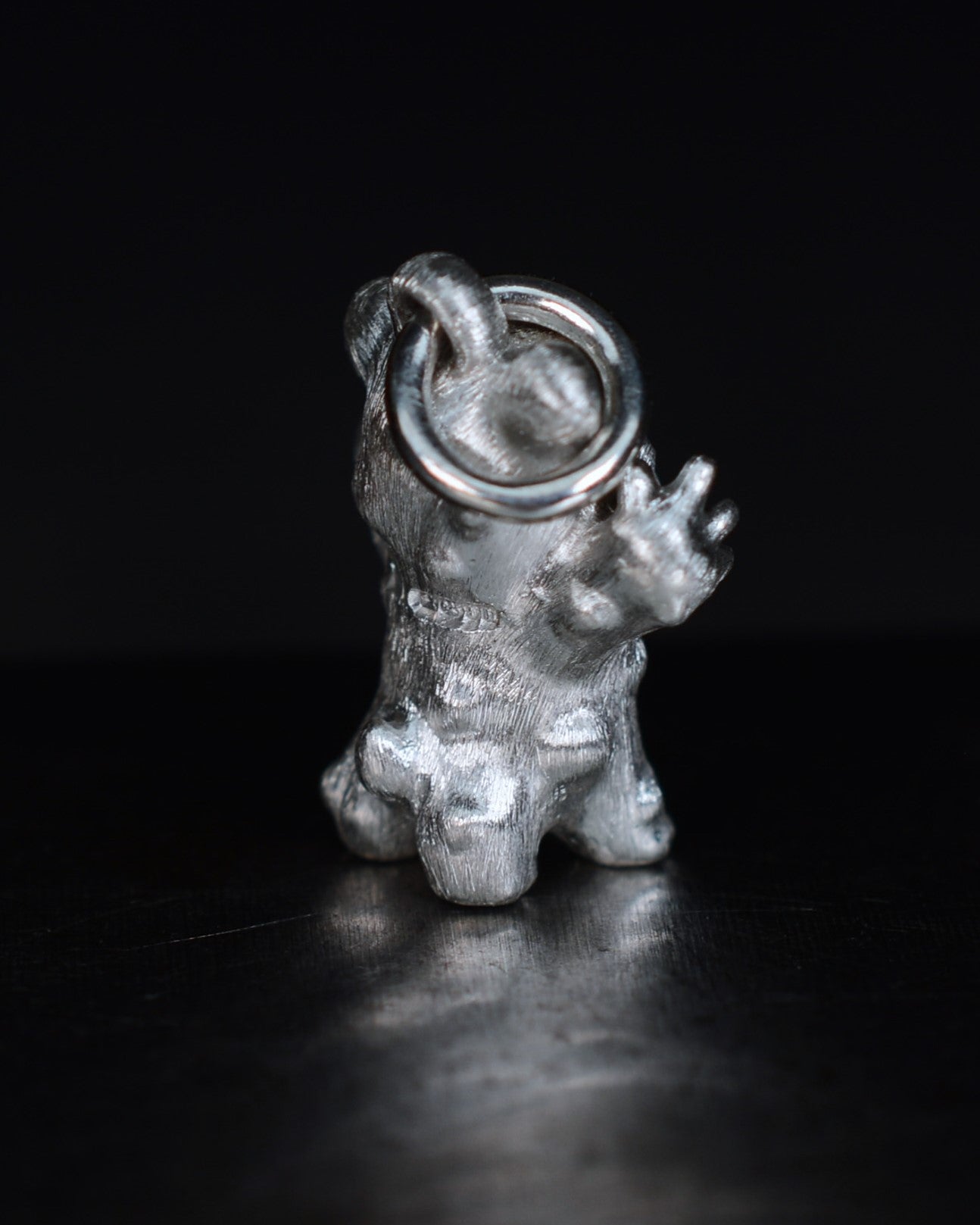 De Bears Cub Bright Creature with a black diamond and a black rhodium face.