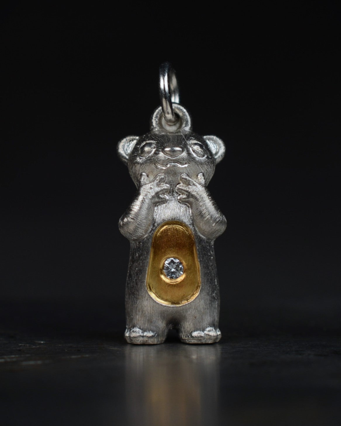 Delighted Stoat type Bright Creature with a diamond and parcel gilt.