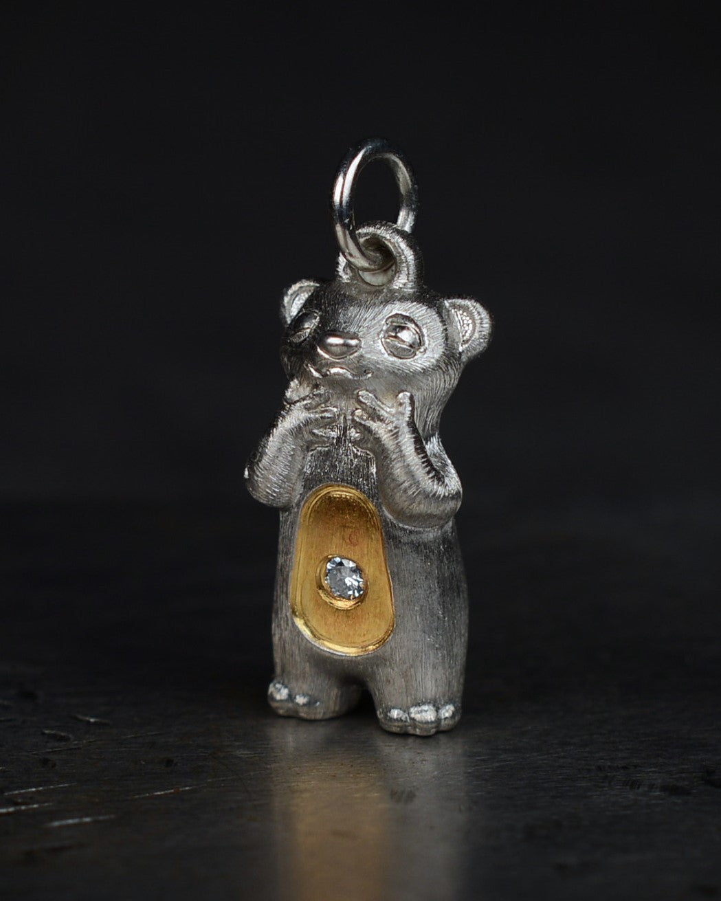Delighted Stoat type Bright Creature with a diamond and parcel gilt.