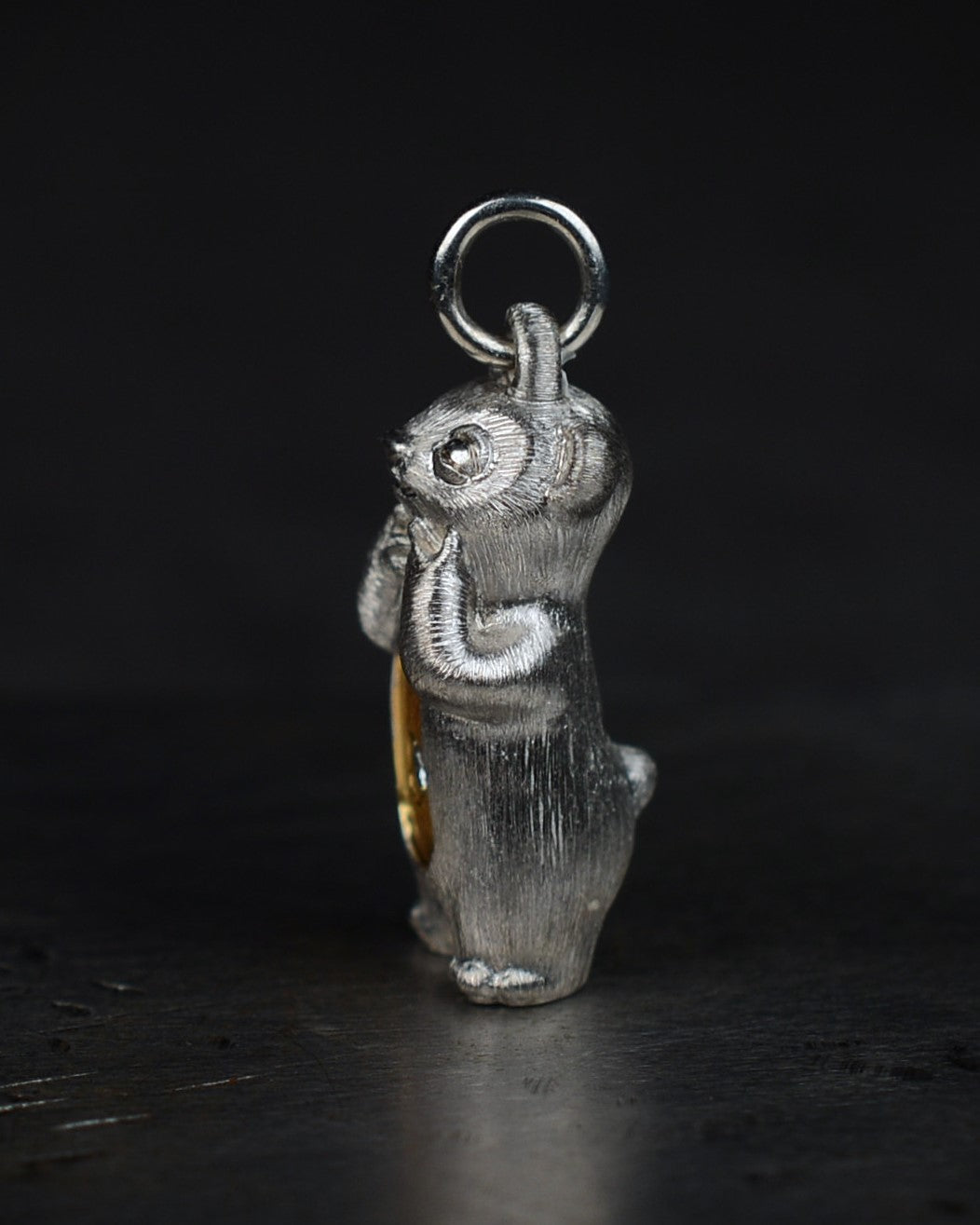 Delighted Stoat type Bright Creature with a diamond and parcel gilt.