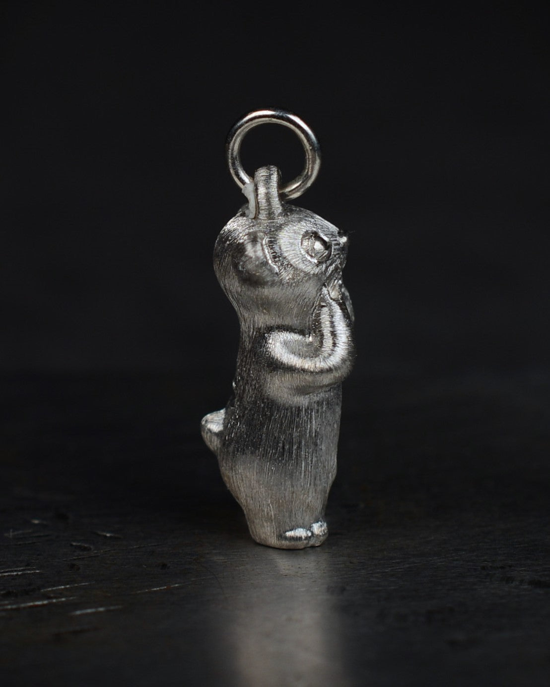 Delighted Stoat type Bright Creature with a diamond and parcel gilt.