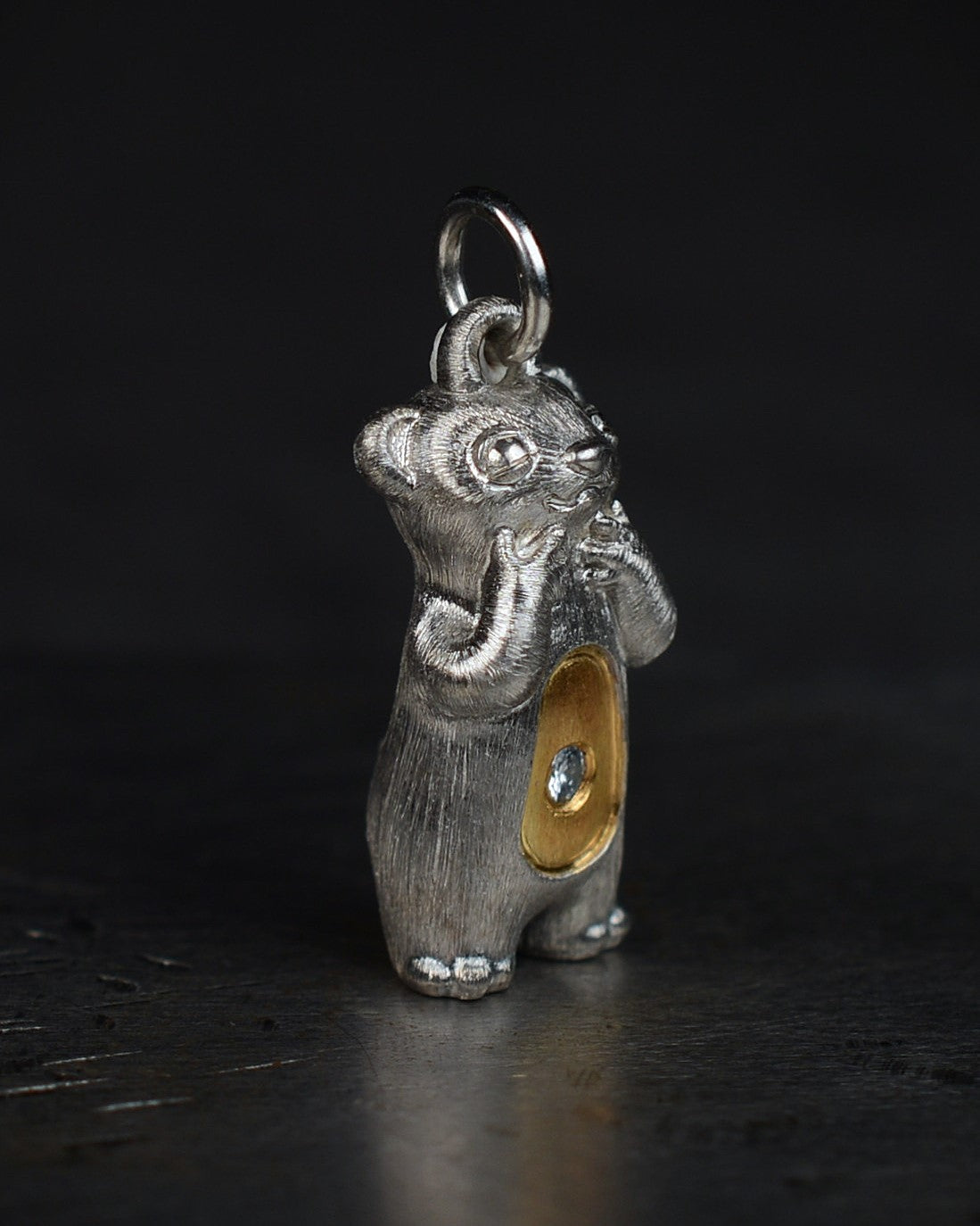 Delighted Stoat type Bright Creature with a diamond and parcel gilt.