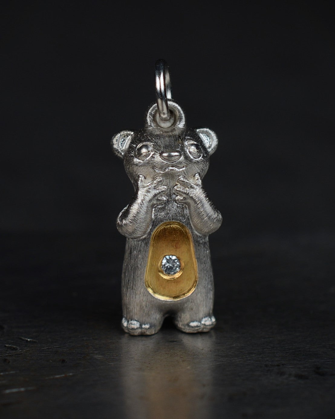 Delighted Stoat type Bright Creature with a diamond and parcel gilt.
