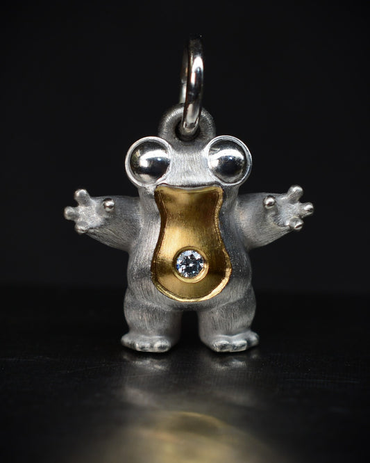 Small frog type Bright Creature with a diamond and parcel gilt.