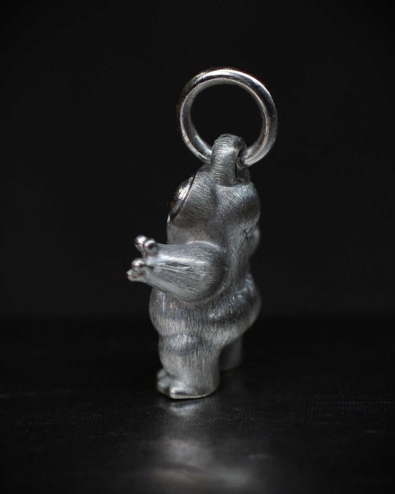 Small frog type Bright Creature with a diamond and parcel gilt.