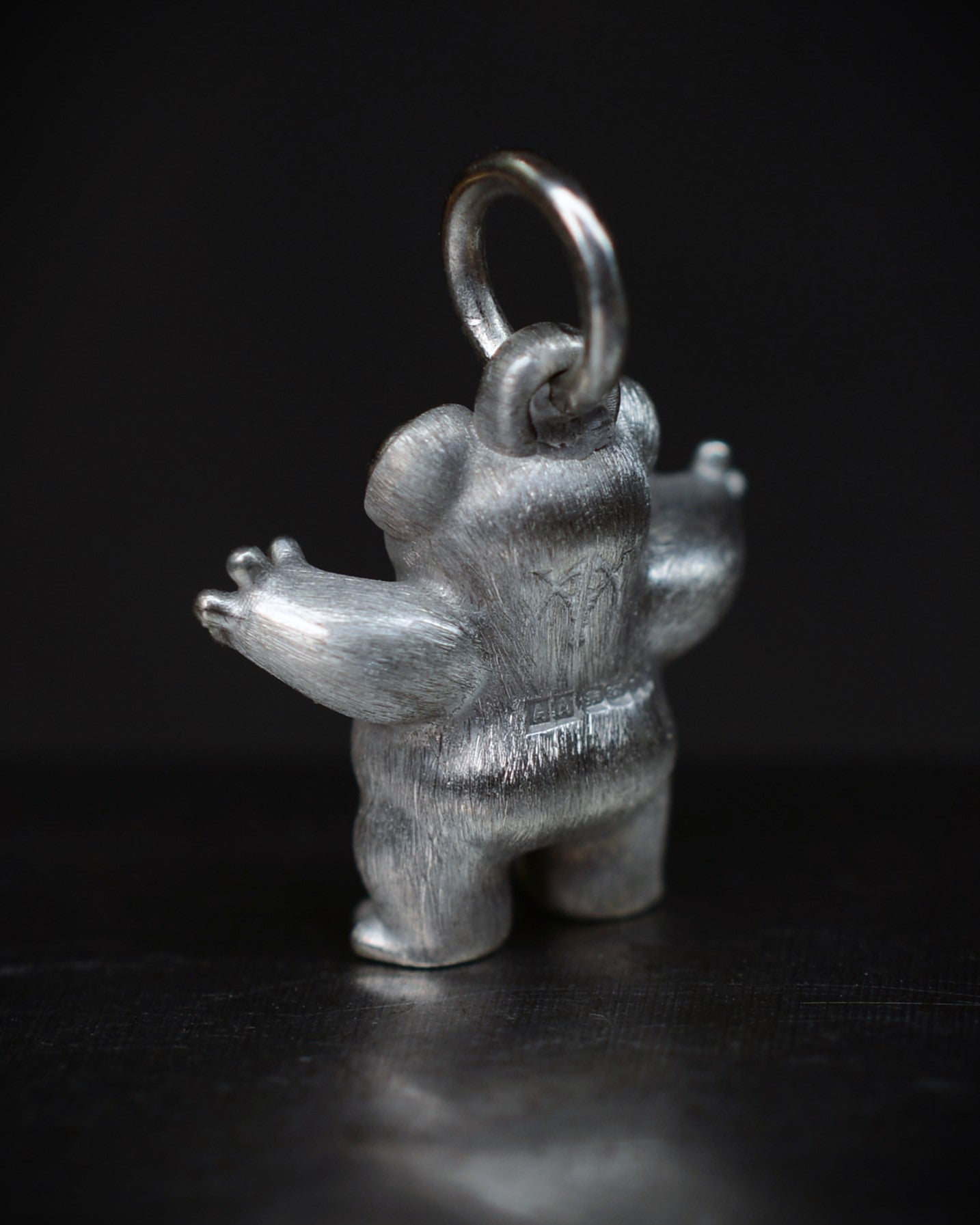 Small frog type Bright Creature with a diamond and parcel gilt.