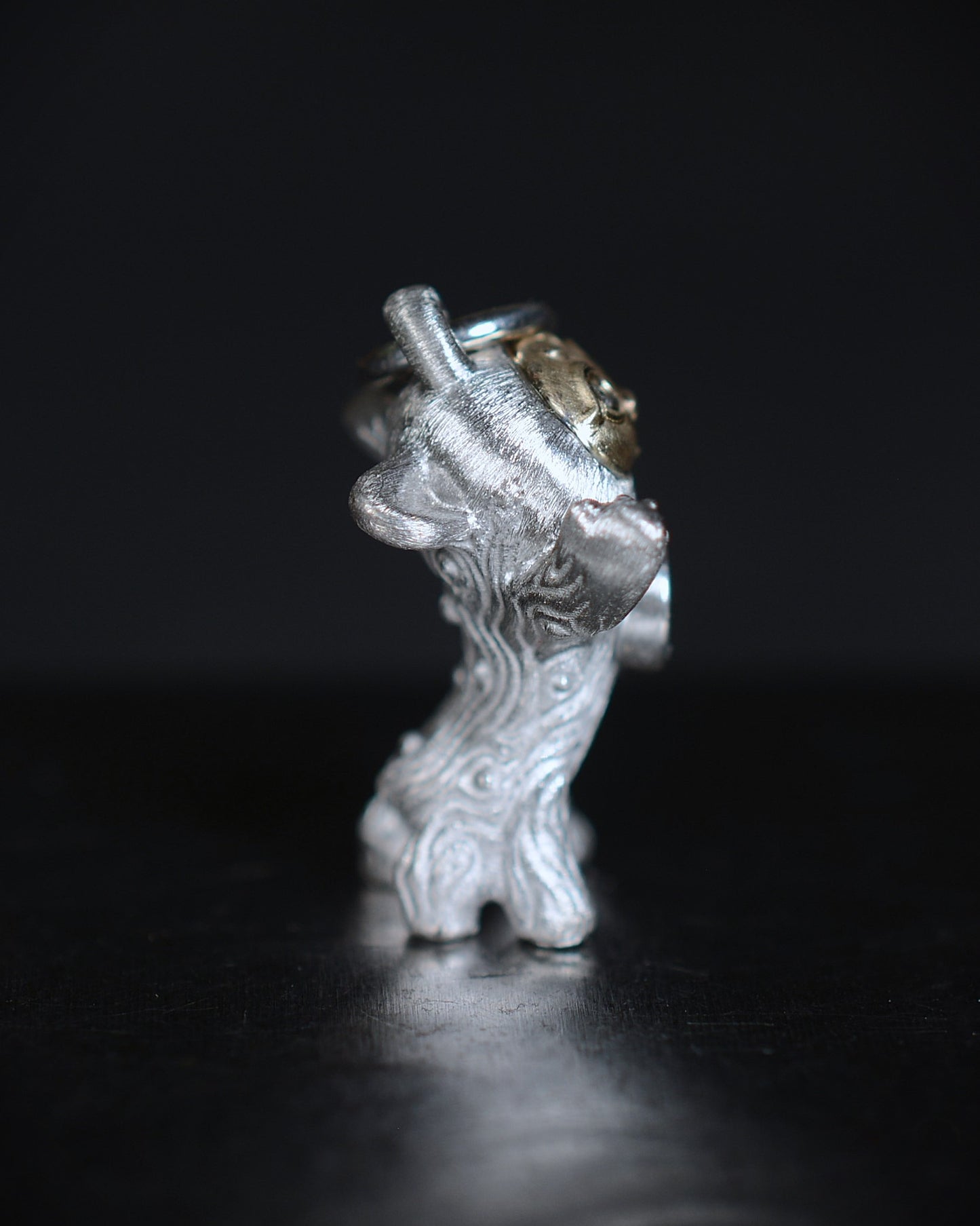 Diamond Heart Cub Bright Creature, with a gold face and diamonds.