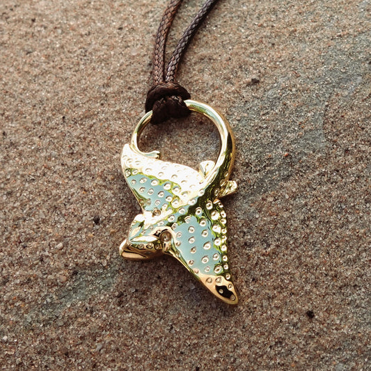 Eagle Ray necklace. 18ct gold, double sided pendant set with diamond eyes. Handmade to order. © Adrian Ashley