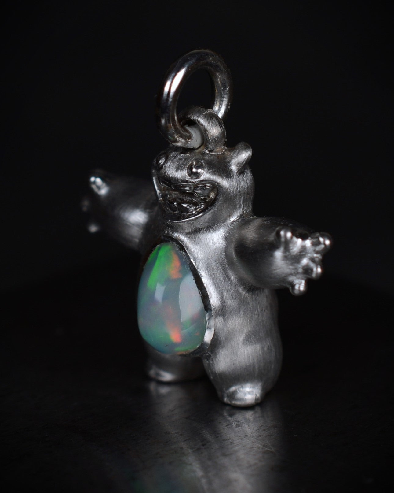 Happy chubby Bright Creature Companion Being with a jelly opal belly.
