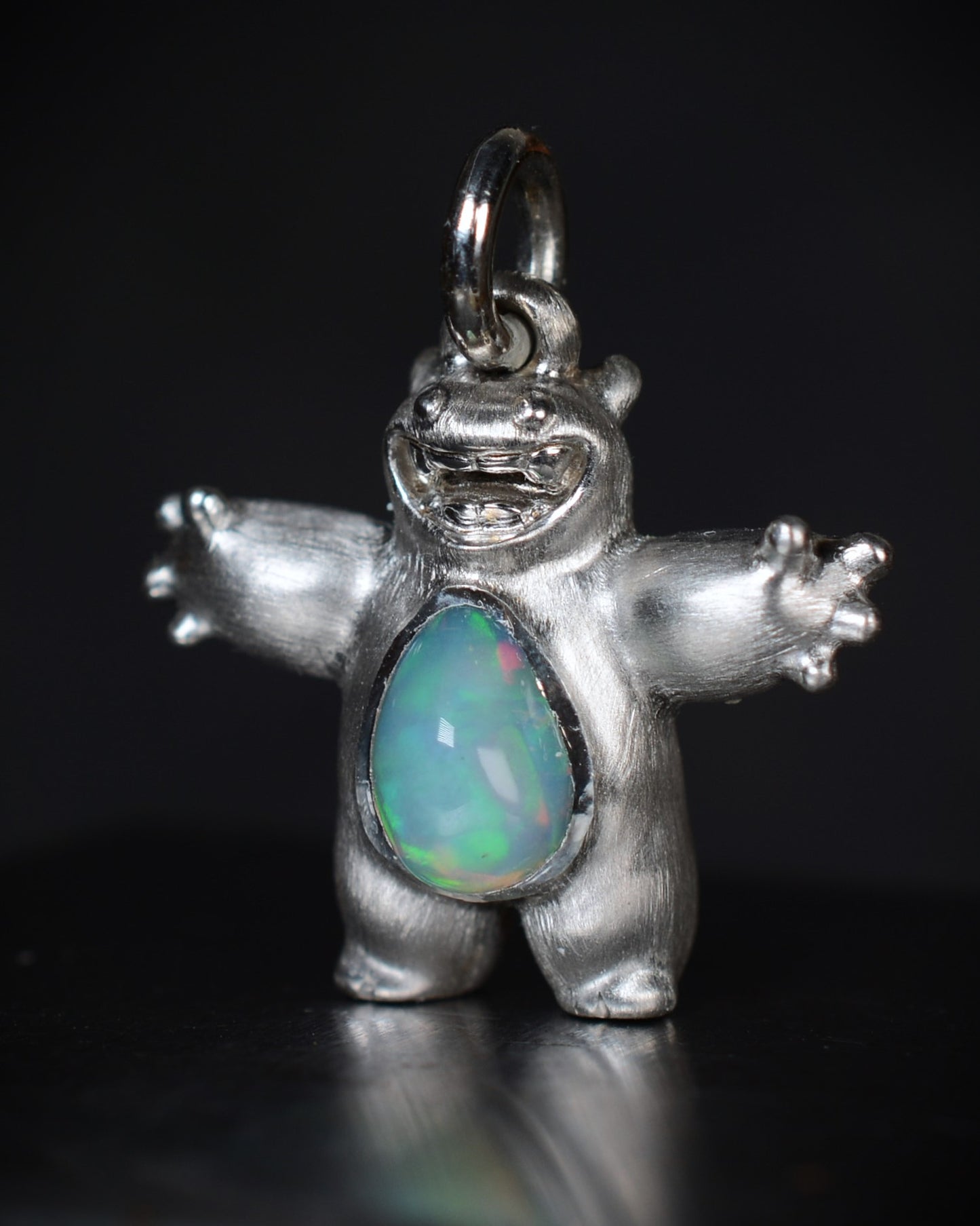 Happy chubby Bright Creature Companion Being with a jelly opal belly.