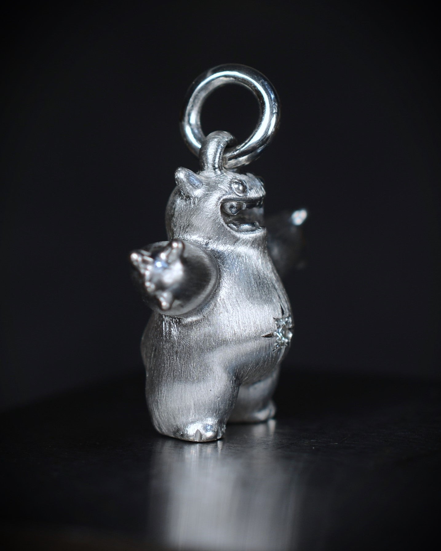 Happy chubby Bright Creature Companion Being with a star set diamond belly.