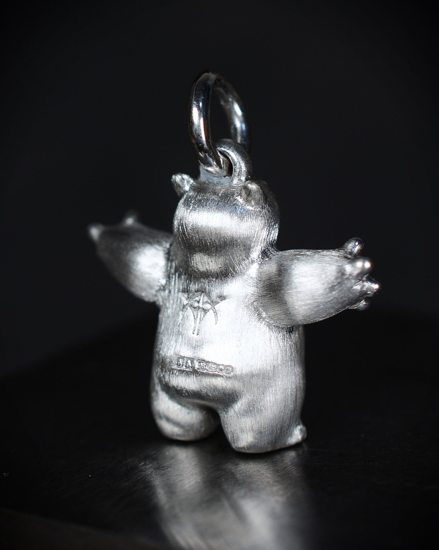 Happy chubby Bright Creature Companion Being with a star set diamond belly.