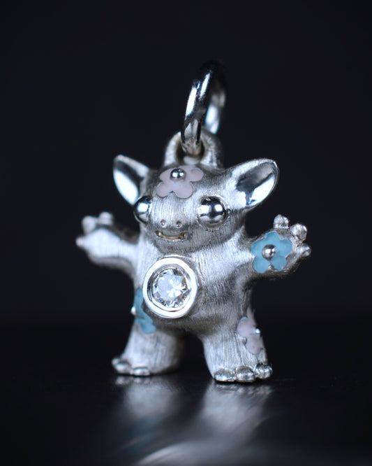 Flower Girl Creature set with a natural diamond.