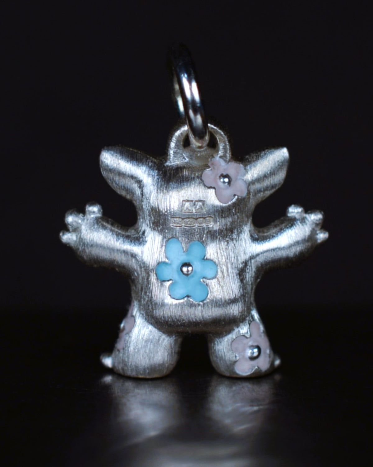 Flower Girl Creature set with a natural diamond.