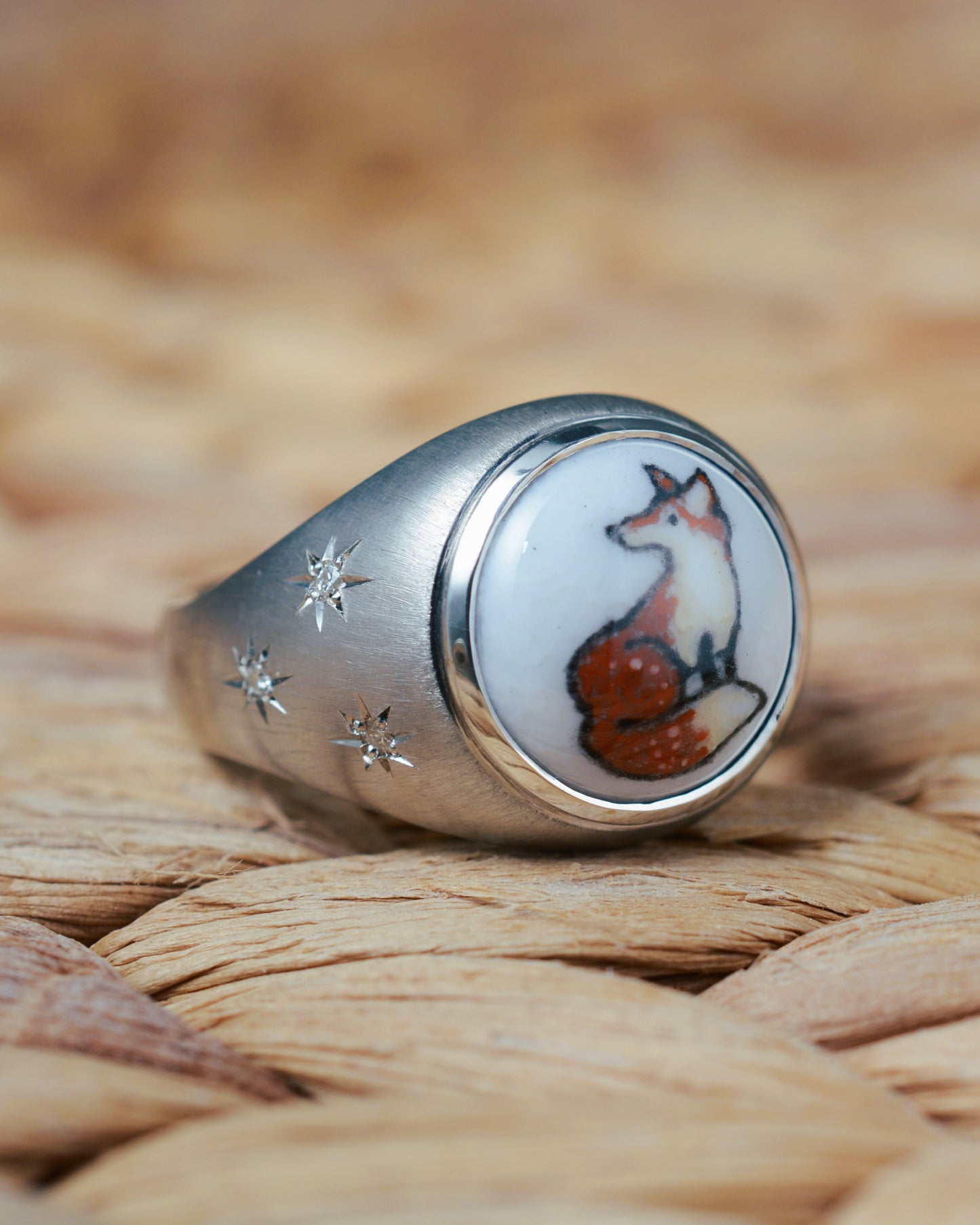 Enamelled fox ring set with diamonds