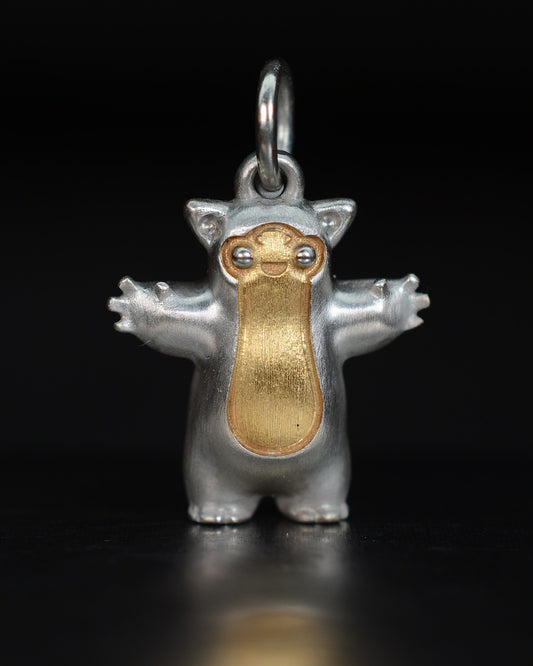 Fox eared small pearshape Bright Creature with parcel gilt.