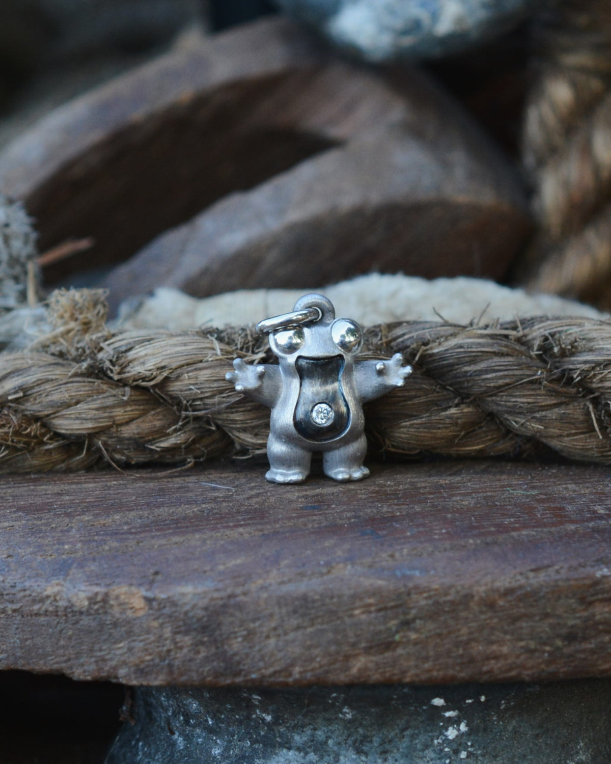 Frog type Bright Creature with a diamond and black rhodium.