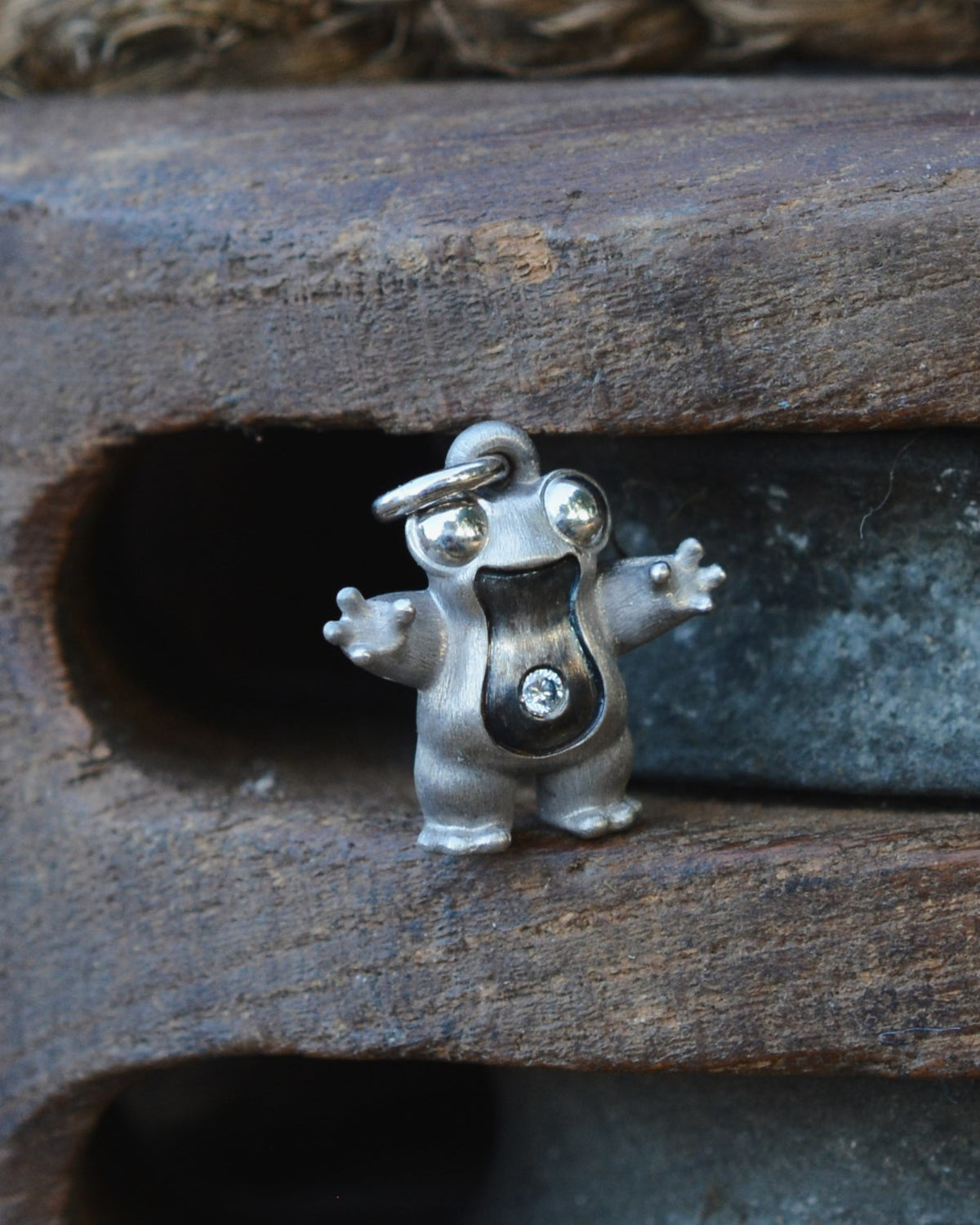 Frog type Bright Creature with a diamond and black rhodium.