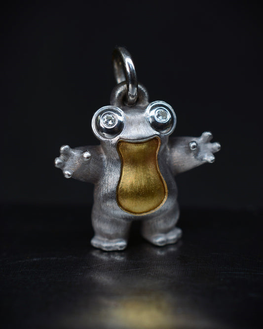 Frog type Bright Creature with diamond eyes and parcel gilt.