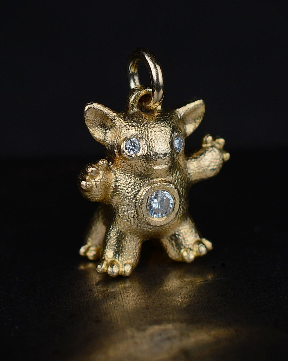 Gold Centaur, Bright Creature set with a natural diamond.