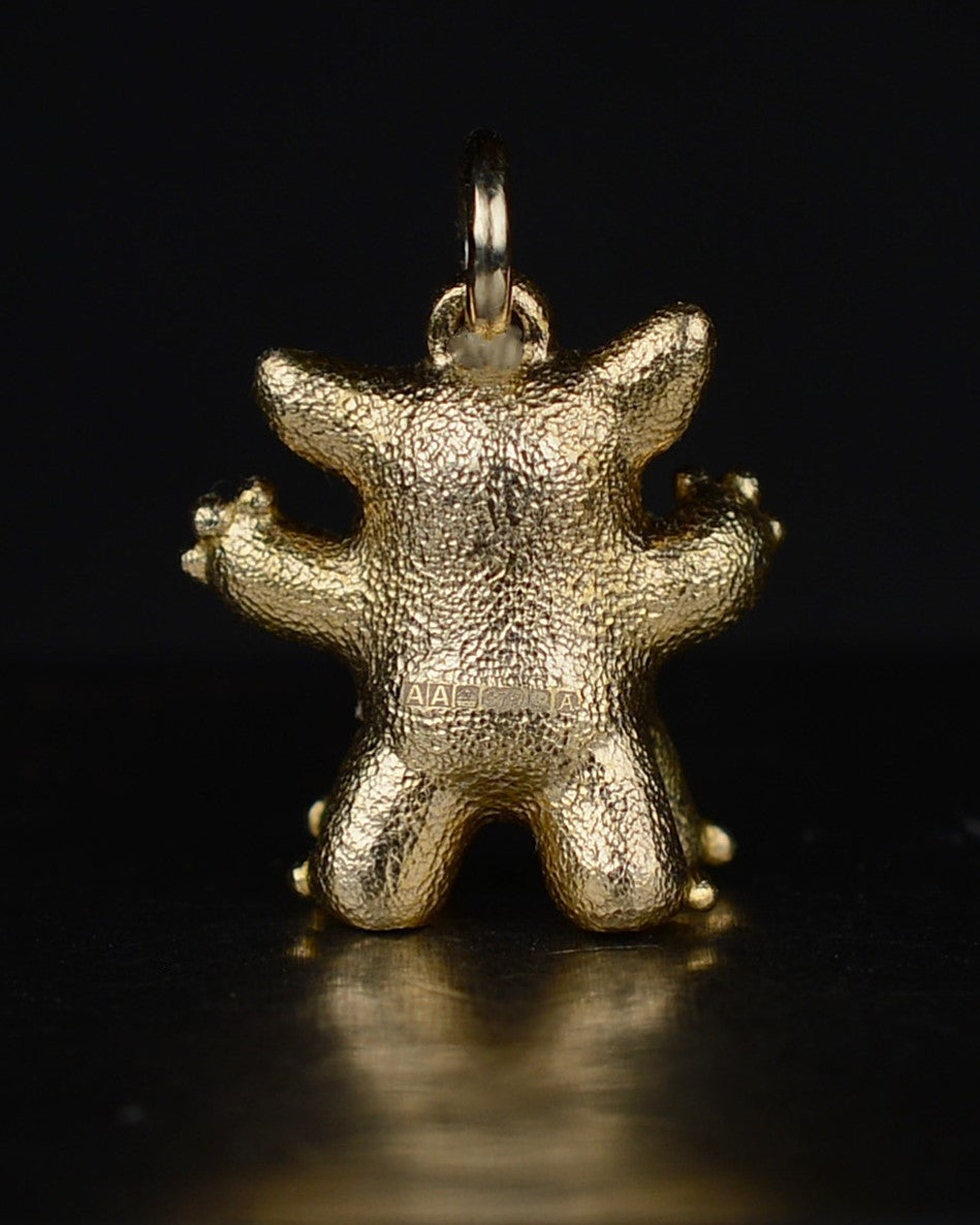 Gold Centaur, Bright Creature set with a natural diamond.