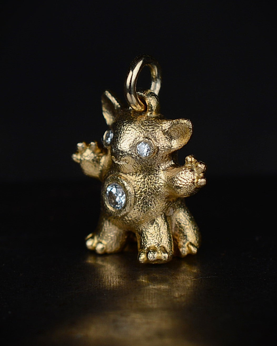 Gold Centaur, Bright Creature set with a natural diamond.
