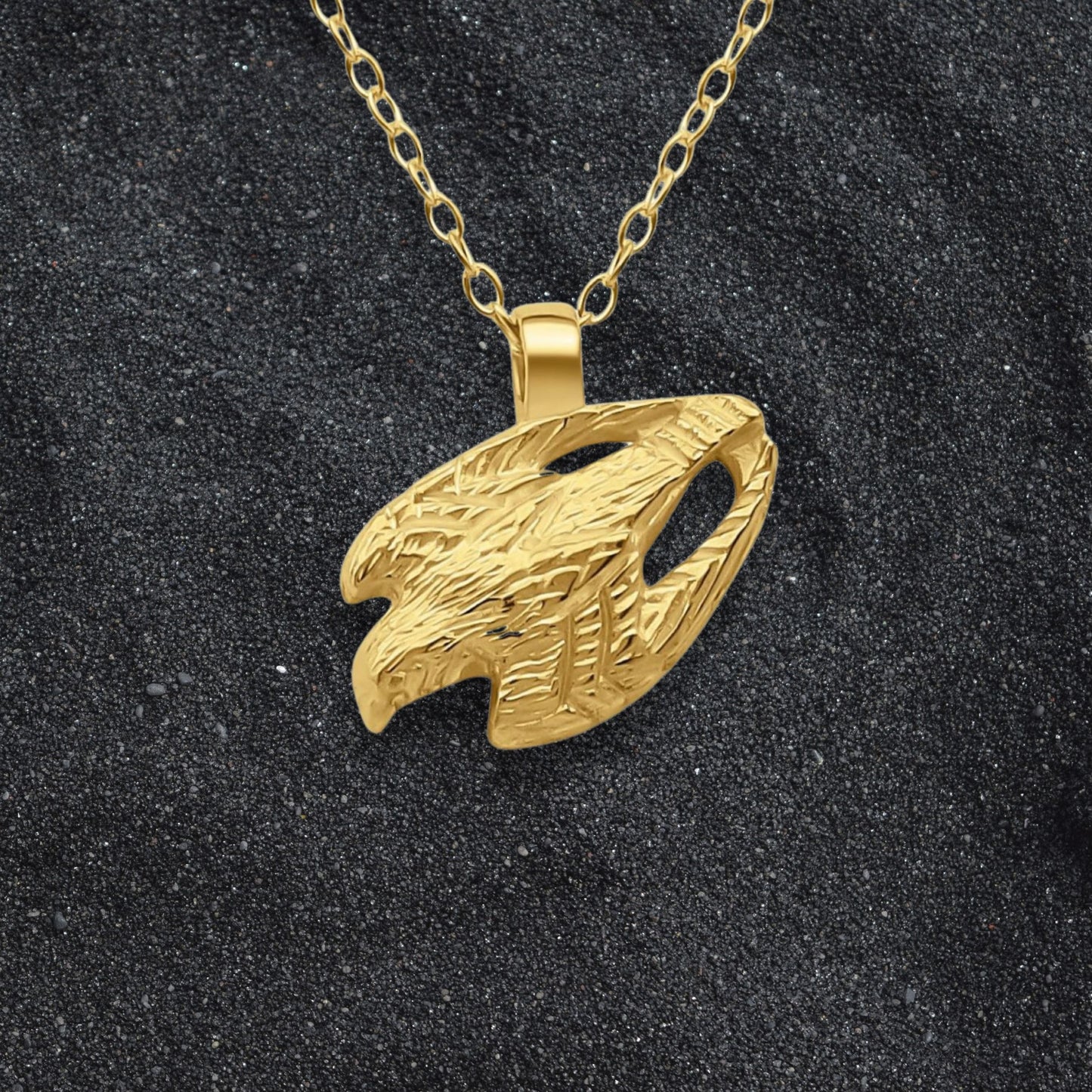 Solid gold Falcon charm pendant and chain. Hand made to order. © Adrian Ashley