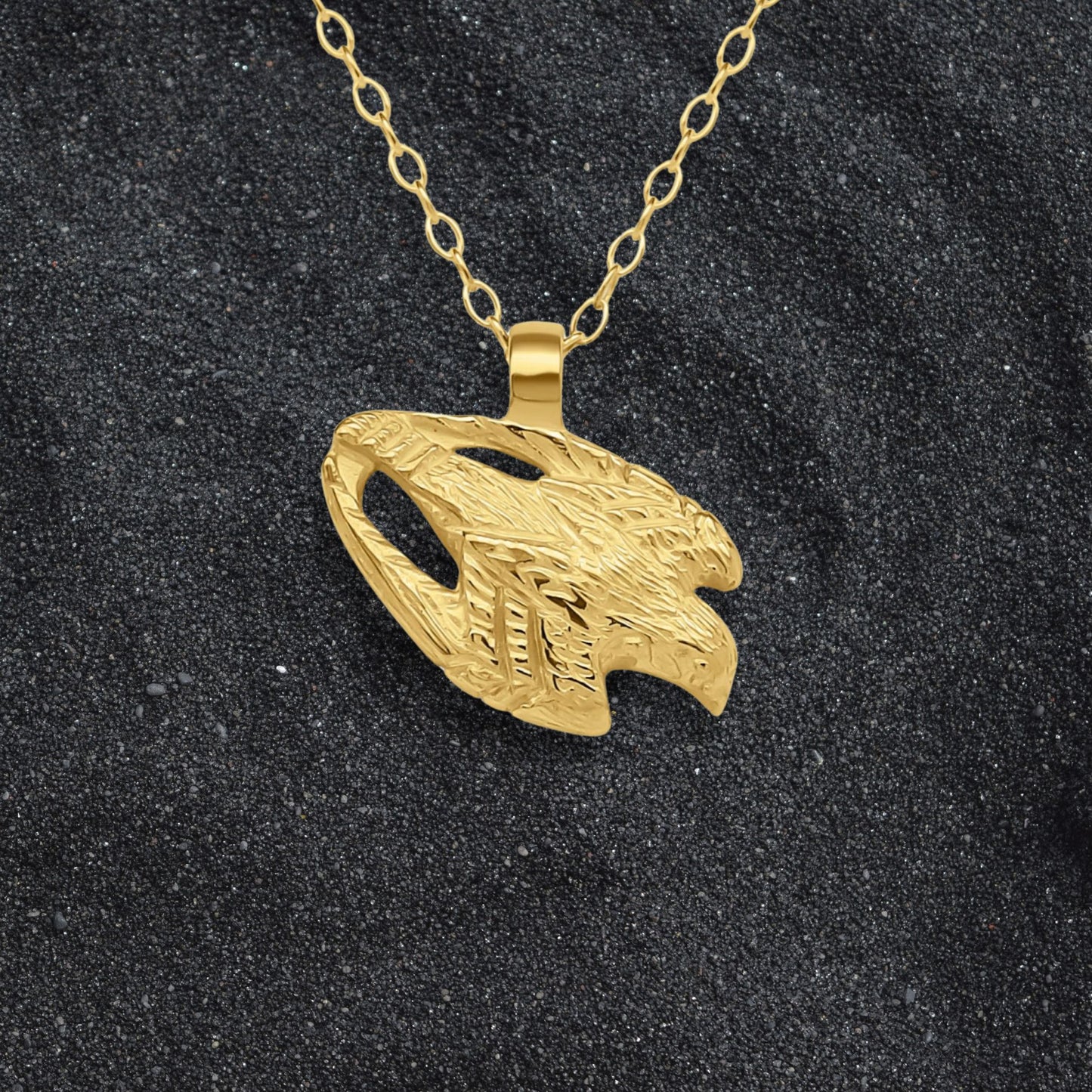 Solid gold Falcon charm pendant and chain. Hand made to order. © Adrian Ashley