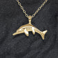 Solid gold Ichthyosaur charm pendant and chain. Hand made to order. © Adrian Ashley