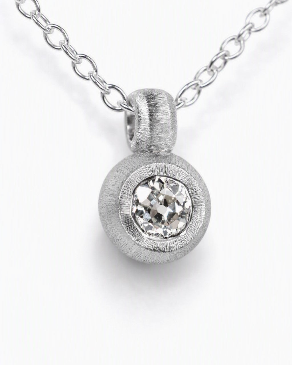 Pendant featuring a 0.38ct Old-cut diamond reclaimed from vintage jewellery.