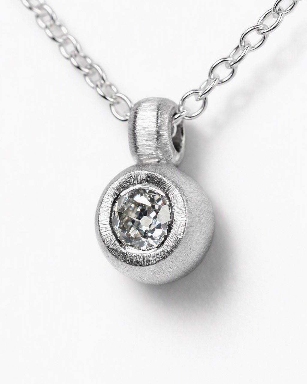 Pendant featuring a 0.38ct Old-cut diamond reclaimed from vintage jewellery.