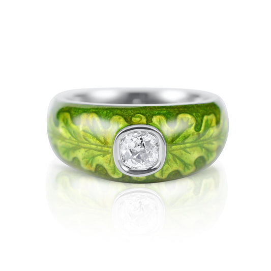 Old cut diamond ring with an enamelled oak leaf motif