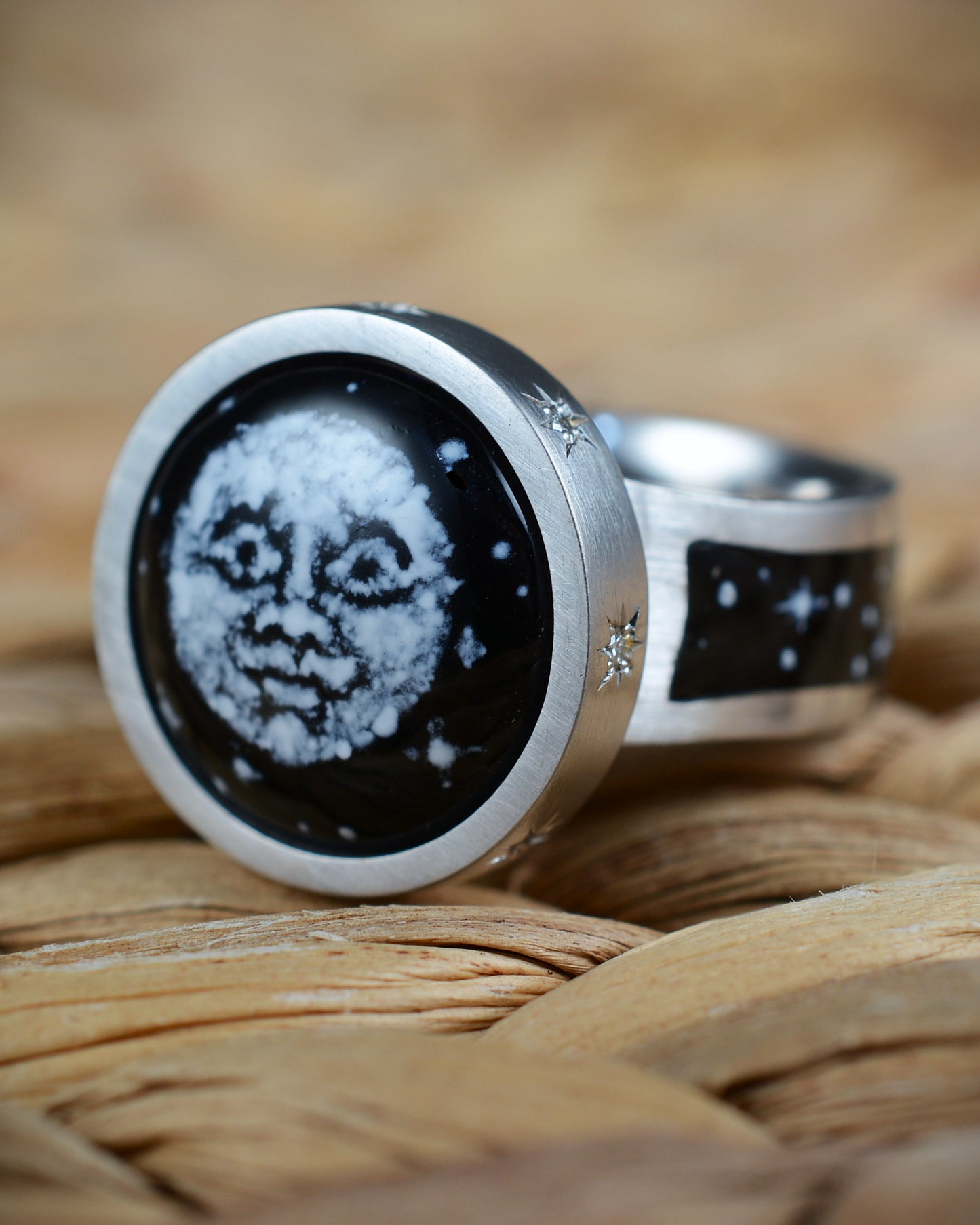 Enamel and diamond Man in the Moon ring.