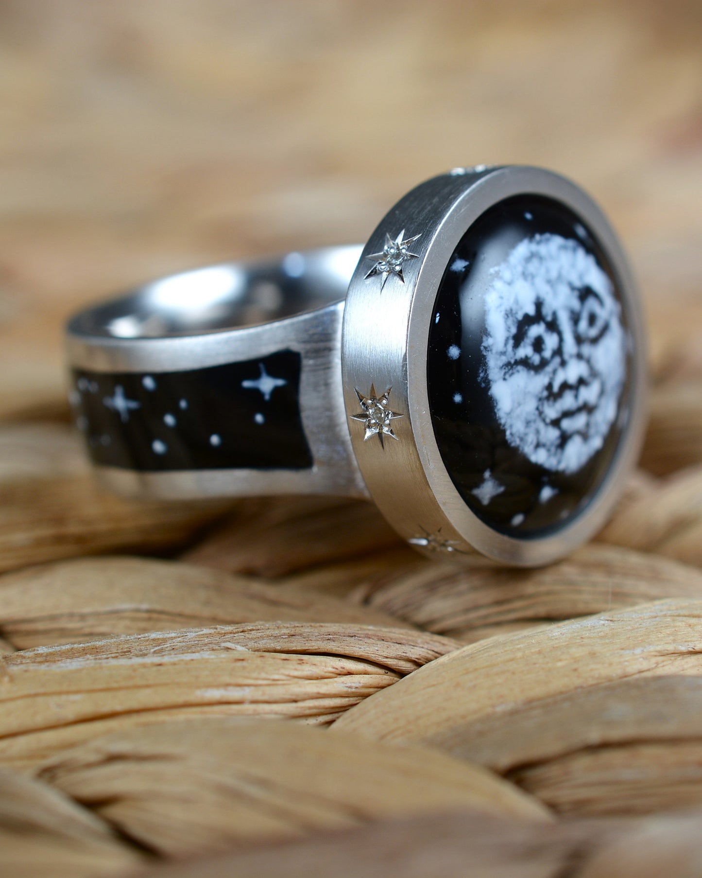 Enamel and diamond Man in the Moon ring.