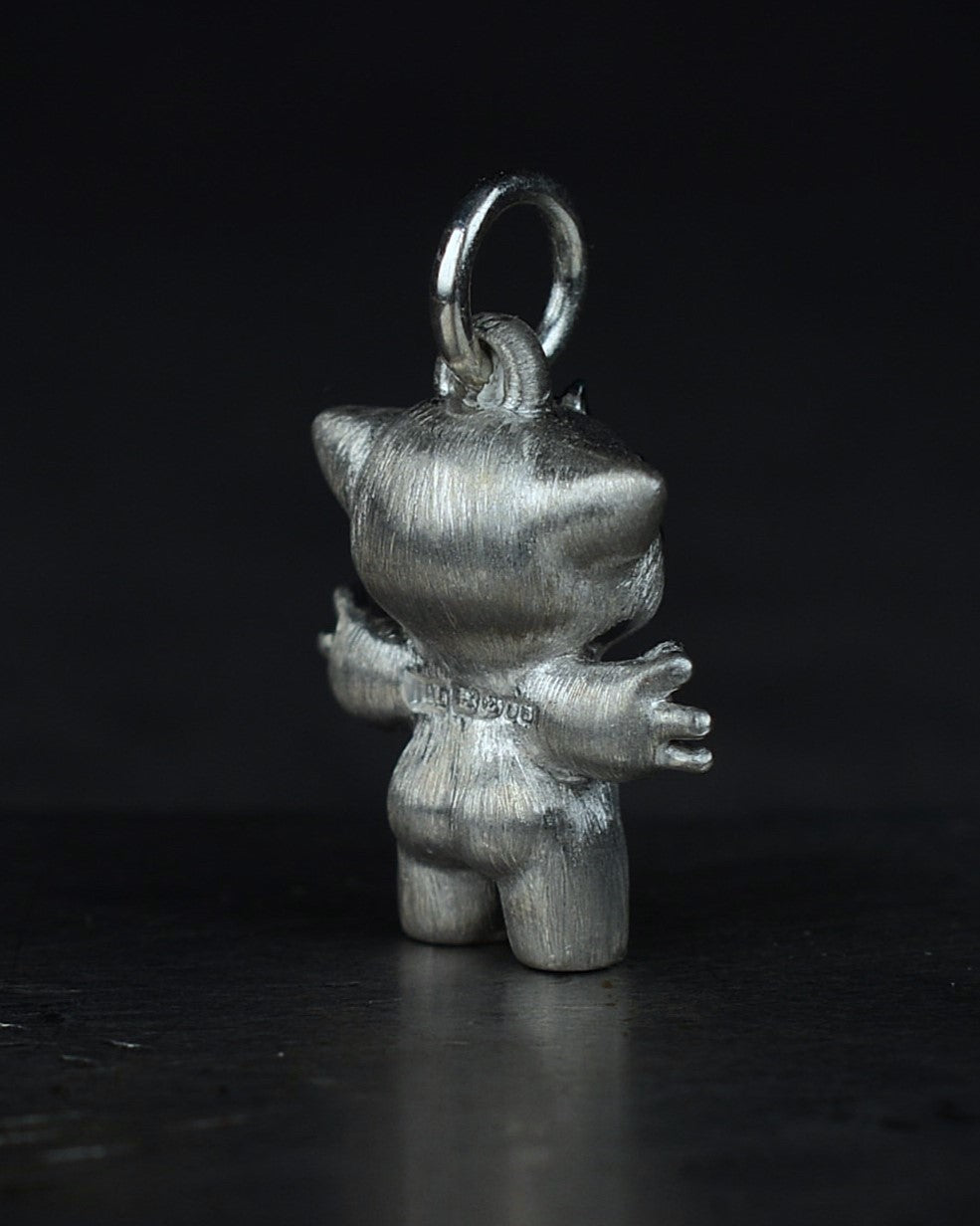Noisy Bright Creature with black rhodium and a diamond-set belly.