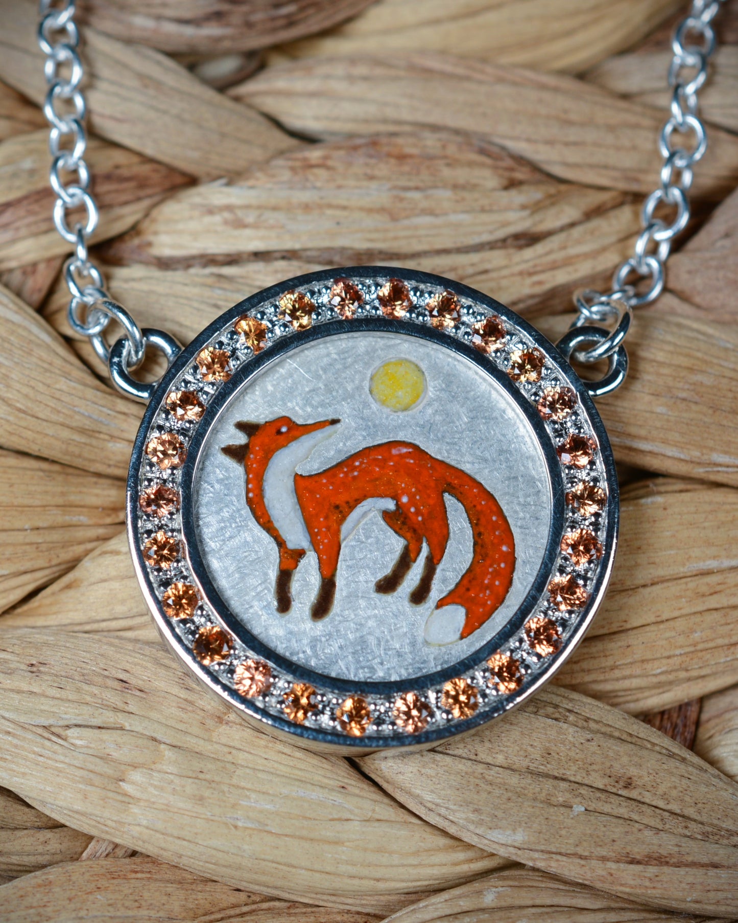 Orange Sapphire and enamel fox pendant and chain.