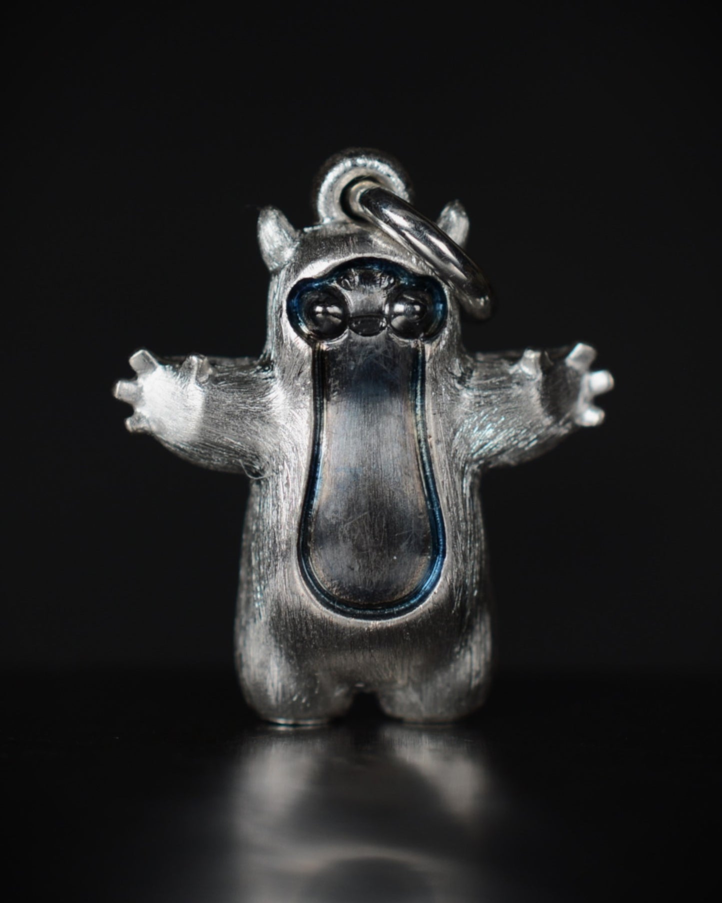 Pearshape Bright Creature Companion Being with black rhodium