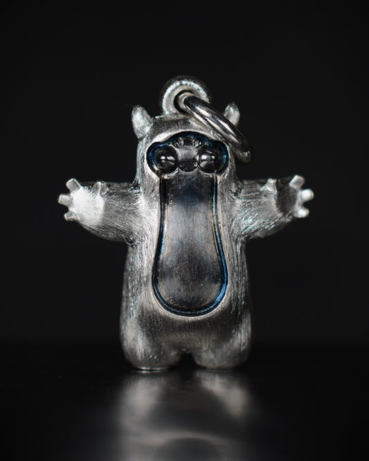 Pearshape Bright Creature Companion Being with black rhodium