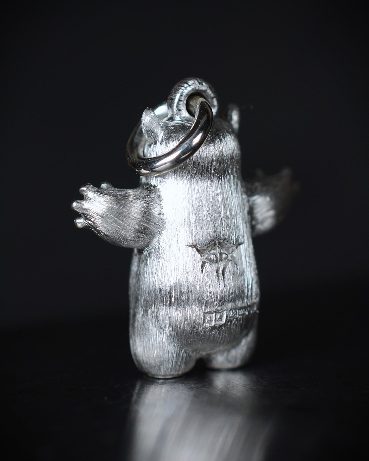 Pearshape Bright Creature Companion Being with black rhodium